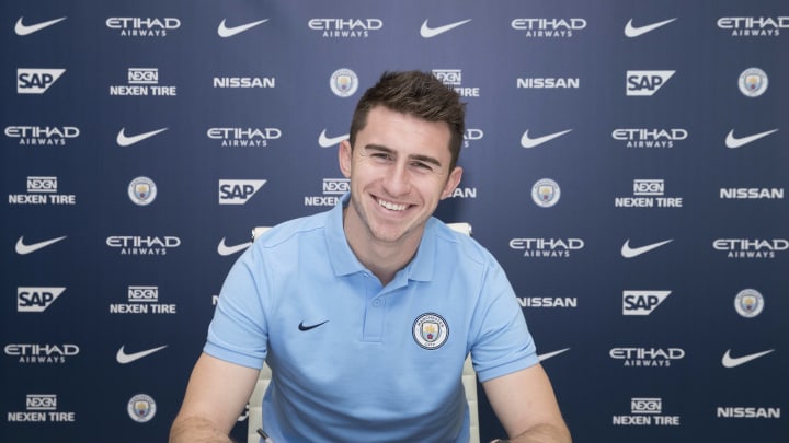 MANCHESTER, ENGLAND – JANUARY 30: (EXCLUSIVE COVERAGE) New signing Aymeric Laporte takes part in the official signing photo at Manchester City Football Academy on January 30, 2018 in Manchester, England. (Photo by Victoria Haydn/Man City via Getty Images)