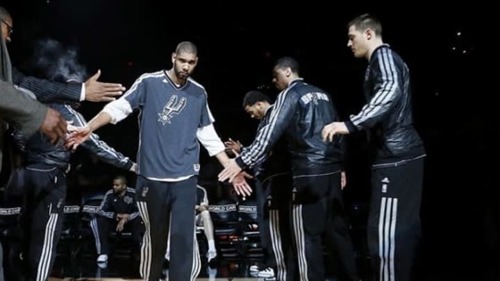 Apr 17, 2013; San Antonio, TX, USA; San Antonio Spurs forward Tim Duncan (21) during player introductions before the game against the Minnesota Timberwolves at the AT