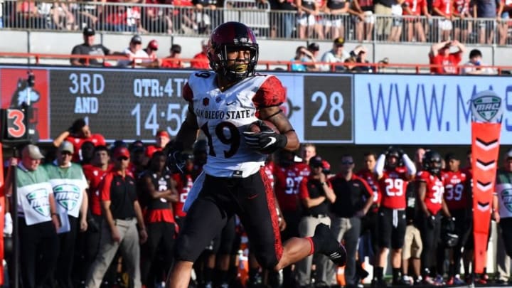 Sep 17, 2016; DeKalb, IL, USA; San Diego State Aztecs running back Donnel Pumphrey (19) rushes for a touchdown during the second half against Northern Illinois Huskies at Huskie Stadium. Mandatory Credit: Mike DiNovo-USA TODAY Sports