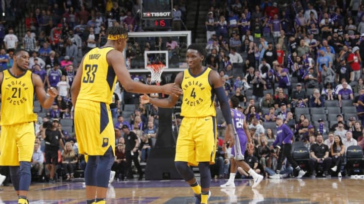 SACRAMENTO, CA - MARCH 29: Victor Oladipo #4 and Myles Turner #33 of the Indiana Pacers high five during the game against the Sacramento Kings on March 29, 2018 at Golden 1 Center in Sacramento, California. NOTE TO USER: User expressly acknowledges and agrees that, by downloading and or using this photograph, User is consenting to the terms and conditions of the Getty Images Agreement. Mandatory Copyright Notice: Copyright 2018 NBAE (Photo by Rocky Widner/NBAE via Getty Images) SACRAMENTO, CA - MARCH 29: Victor Oladipo #4 and Myles Turner #33 of the Indiana Pacers high five during the game against the Sacramento Kings on March 29, 2018 at Golden 1 Center in Sacramento, California. NOTE TO USER: User expressly acknowledges and agrees that, by downloading and or using this photograph, User is consenting to the terms and conditions of the Getty Images Agreement. Mandatory Copyright Notice: Copyright 2018 NBAE (Photo by Rocky Widner/NBAE via Getty Images)
