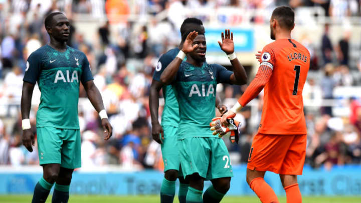 NEWCASTLE UPON TYNE, ENGLAND - AUGUST 11: Serge Aurier of Tottenham Hotspur and Hugo Lloris of Tottenham Hotspur celebrate following their sides victory in the Premier League match between Newcastle United and Tottenham Hotspur at St. James Park on August 11, 2018 in Newcastle upon Tyne, United Kingdom. (Photo by Tony Marshall/Getty Images)