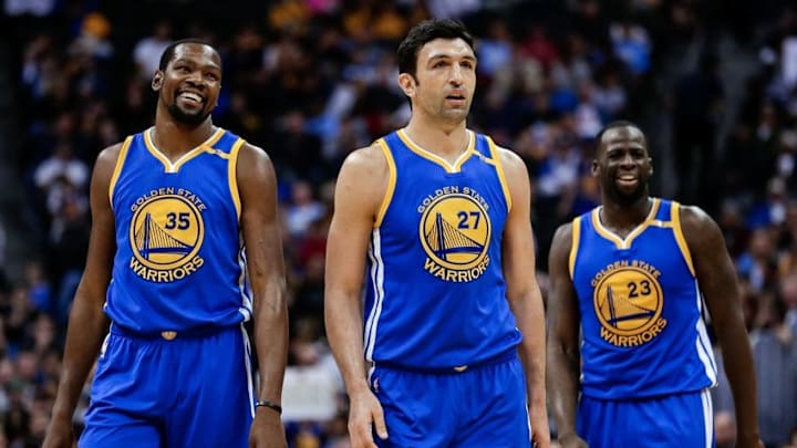 Nov 10, 2016; Denver, CO, USA; Golden State Warriors center Zaza Pachulia (27) and forward Kevin Durant (35) and forward Draymond Green (23) in the third quarter against the Denver Nuggets at the Pepsi Center. Mandatory Credit: Isaiah J. Downing-USA TODAY Sports