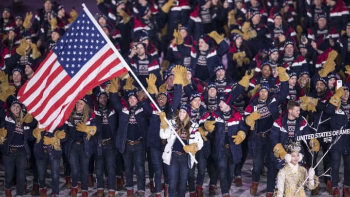 PYEONGCHANG-GUN, SOUTH KOREA - FEBRUARY 09: Flag bearer Erin Hamlin of the United States leads the team during the Opening Ceremony of the PyeongChang 2018 Winter Olympic Games at PyeongChang Olympic Stadium on February 9, 2018 in Pyeongchang-gun, South Korea. (Photo by XIN LI/Getty Images)