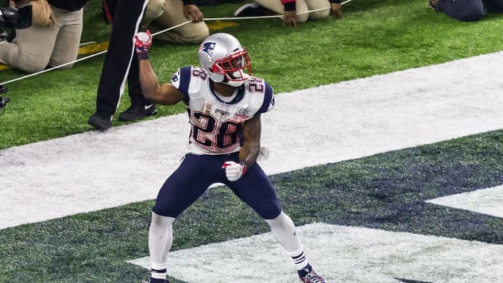 HOUSTON, TX - FEBRUARY 05: New England Patriots running back James White (28) celebrates after scoring a touchdown during the Super Bowl LI between the New England Patriots and Atlanta Falcon on February 5, 2017 at NRG Stadium in Houston, Texas. i(Photo by Leslie Plaza Johnson/Icon Sportswire via Getty Images)