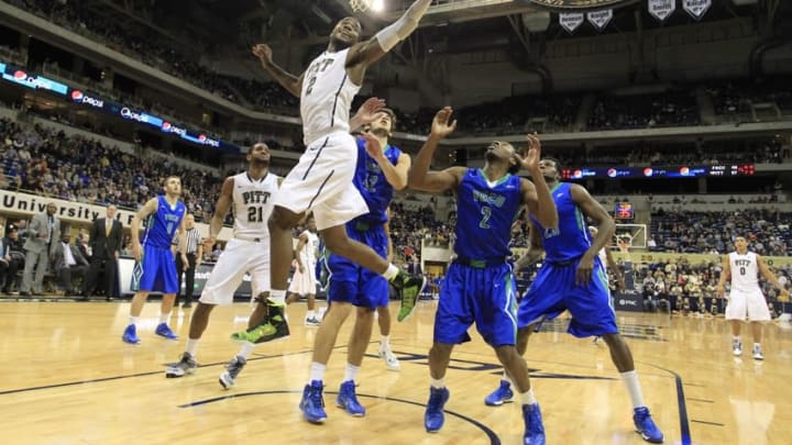 Dec 30, 2014; Pittsburgh, PA, USA; Pittsburgh Panthers forward Michael Young (2) reaches for a rebound against the Florida Gulf Coast Eagles during the second half at the Petersen Events Center. Pittsburgh won 71-54. Mandatory Credit: Charles LeClaire-USA TODAY Sports