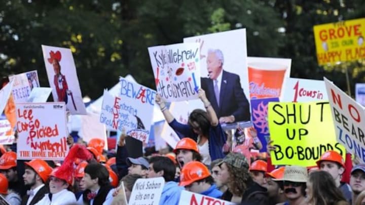 Oct 4, 2014; Oxford, MS, USA; Fans wave signs for ESPN College Gameday prior to the Mississippi Rebels game against the Alabama Crimson Tide at Vaught-Hemingway Stadium. Mandatory Credit: Christopher Hanewinckel-USA TODAY Sports