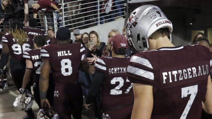 STARKVILLE, MS – NOVEMBER 11: Nick Fitzgerald #7 of the Mississippi State Bulldogs hangs his head as he walks off the field after falling to the Alabama Crimson Tide 31-24 during the second half of an NCAA football game at Davis Wade Stadium on November 11, 2017 in Starkville, Mississippi. (Photo by Butch Dill/Getty Images)