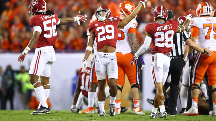 Jan 9, 2017; Tampa, FL, USA; Alabama Crimson Tide defensive back Minkah Fitzpatrick (29) and linebacker Tim Williams (56) react after a fumble recovery during the first quarter against the Clemson Tigers in the 2017 College Football Playoff National Championship Game at Raymond James Stadium. Mandatory Credit: Mark J. Rebilas-USA TODAY Sports