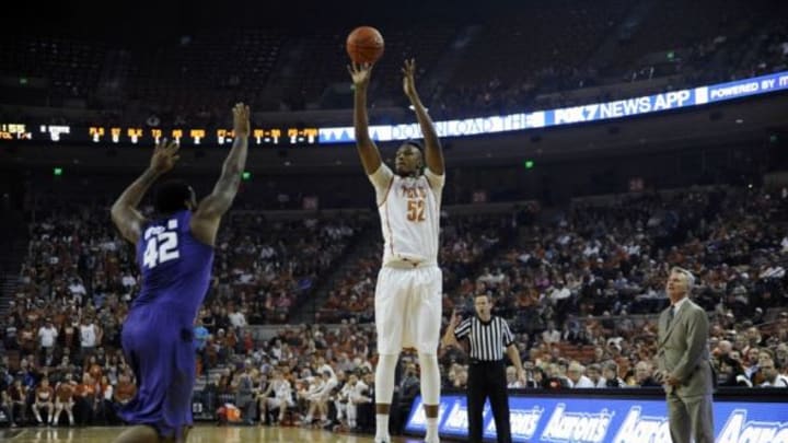 Mar 7, 2015; Austin, TX, USA; Texas Longhorns forward Myles Turner (52) shoots against Kansas State Wildcats forward Thomas Gipson (42) during the first half at the Frank Erwin Special Events Center. Mandatory Credit: Brendan Maloney-USA TODAY Sports