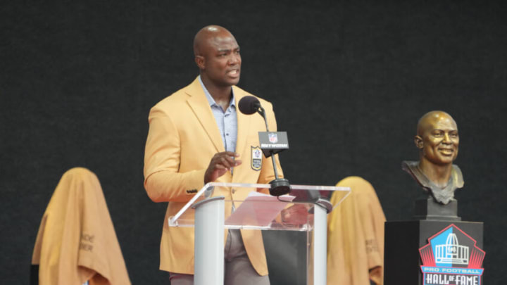 Aug 5, 2023; Canton, OH, USA; Dallas Cowboys and Denver Broncos former linebacker DeMarcus Ware speaks after his bust is unveiled during the 2023 Pro Football Hall of Fame Enshrinement at Tom Benson Hall of Fame Stadium. Mandatory Credit: Kirby Lee-USA TODAY Sports