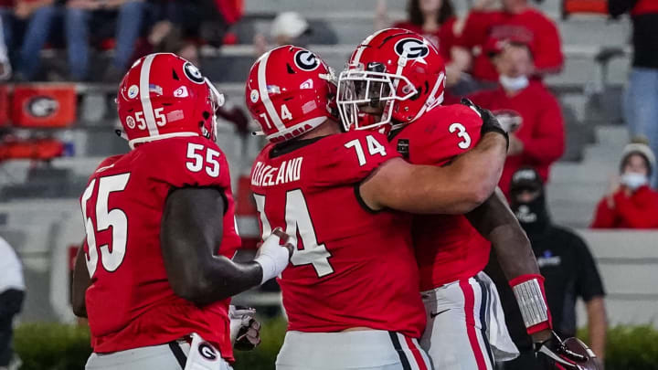 Oct 3, 2020; Athens, Georgia, USA; Georgia Bulldogs running back Zamir White (3) reacts with offensive lineman Ben Cleveland (74) after scoring a touchdown against the Auburn Tigers during the first half at Sanford Stadium. Mandatory Credit: Dale Zanine-USA TODAY Sports
