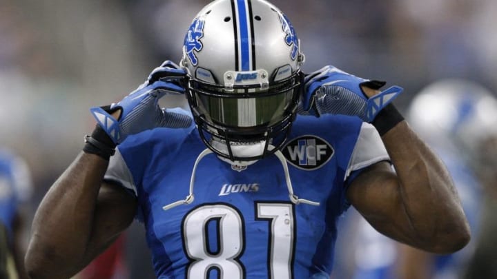 Nov 22, 2015; Detroit, MI, USA; Detroit Lions wide receiver Calvin Johnson (81) adjusts his helmet during the second quarter against the Oakland Raiders at Ford Field. Mandatory Credit: Raj Mehta-USA TODAY Sports