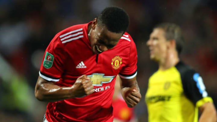 MANCHESTER, ENGLAND – SEPTEMBER 20: Anthony Martial of Manchester United celebrates scoring his sides fourth goal during the Carabao Cup Third Round match between Manchester United and Burton Albion at Old Trafford on September 20, 2017 in Manchester, England. (Photo by Richard Heathcote/Getty Images)