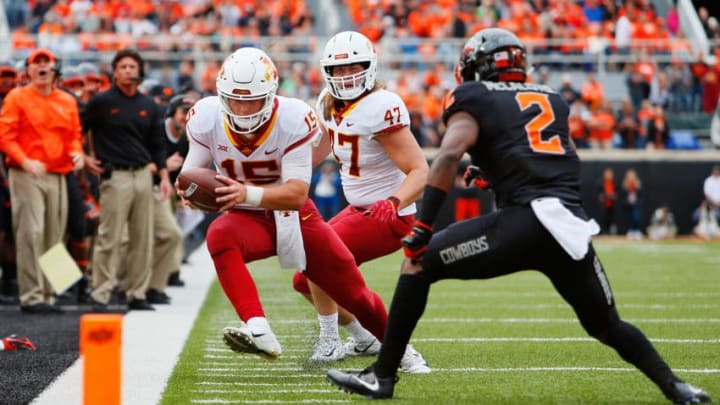 STILLWATER, OK - OCTOBER 6: Quarterback Brock Purdy #15 of the Iowa State Cyclones stretches for a first down against cornerback Tanner McCalister #2 of the Oklahoma State Cowboys in the third quarter on October 6, 2018 at Boone Pickens Stadium in Stillwater, Oklahoma. (Photo by Brian Bahr/Getty Images)