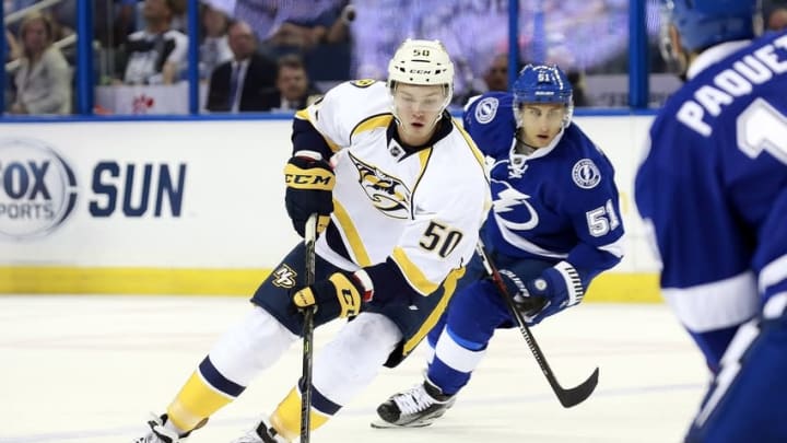 Sep 22, 2015; Tampa, FL, USA; Nashville Predators left wing Vladislav Kamenev (50) skates with the puck as Tampa Bay Lightning center Valtteri Filppula (51) chases during the first period at Amalie Arena. Mandatory Credit: Kim Klement-USA TODAY Sports