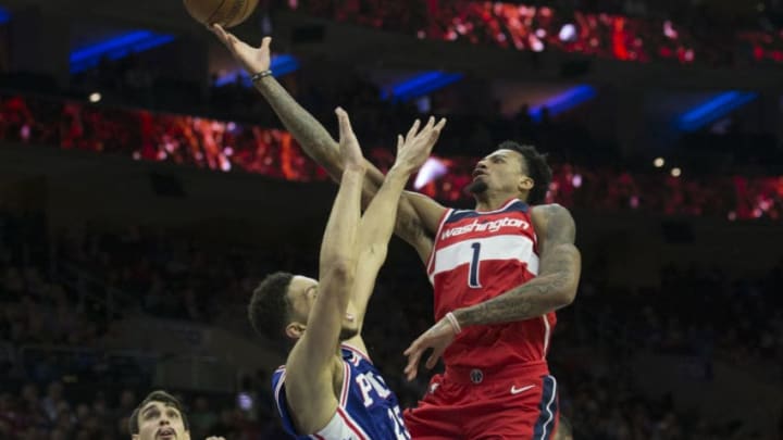 PHILADELPHIA, PA - NOVEMBER 29: Chris McCullough #1 of the Washington Wizards attempts a shot against Ben Simmons #25 of the Philadelphia 76ers in the fourth quarter at the Wells Fargo Center on November 29, 2017 in Philadelphia, Pennsylvania. The 76ers defeated the Wizards 118-113. NOTE TO USER: User expressly acknowledges and agrees that, by downloading and or using this photograph, User is consenting to the terms and conditions of the Getty Images License Agreement. (Photo by Mitchell Leff/Getty Images)