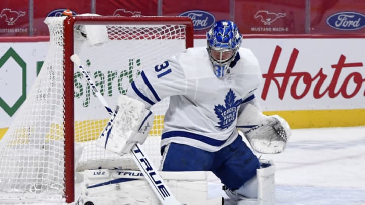 Feb 10, 2021; Montreal, Quebec, CAN; Toronto Maple Leafs goalie Frederik Andersen(31) makes a save during the first period of the game against the Montreal Canadiens at the Bell Centre. Mandatory Credit: Eric Bolte-USA TODAY Sports
