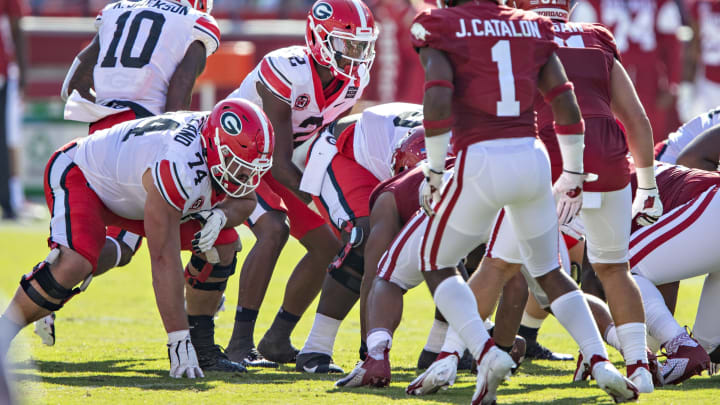 FAYETTEVILLE, AR – SEPTEMBER 26: D”u2019Wan Mathis #2 of the Georgia Bulldogs under center at the line of scrimmage during a game against the Arkansas Razorbacks at Razorback Stadium on September 26, 2020 in Fayetteville, Arkansas The Bulldogs defeated the Razorbacks 37-10. (Photo by Wesley Hitt/Getty Images)