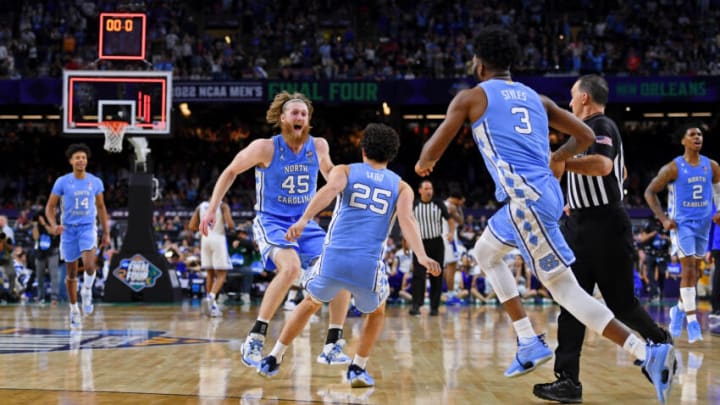Apr 2, 2022; New Orleans, LA, USA; North Carolina Tar Heels forward Brady Manek (45) and guard Creighton Lebo (25) celebrate their win over the Duke Blue Devils after the game during the 2022 NCAA men's basketball tournament Final Four semifinals at Caesars Superdome. Mandatory Credit: Bob Donnan-USA TODAY Sports