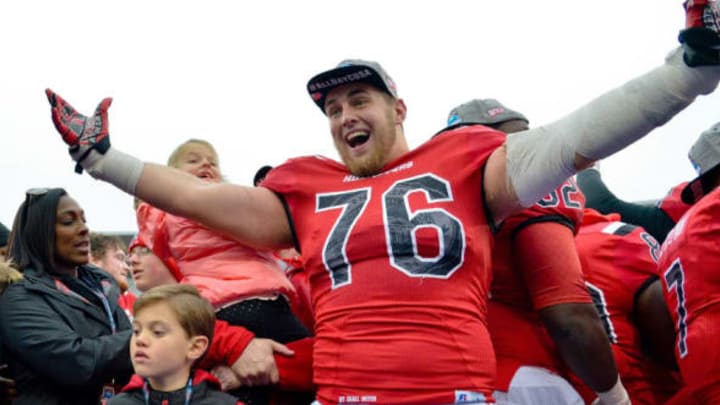 Dec 3, 2016; Bowling Green, KY, USA; Western Kentucky Hilltoppers offensive lineman Forrest Lamp (76) celebrates his teams victory following the CUSA championship game against the Louisiana Tech Bulldogs at Houchens Industries-L.T. Smith Stadium. Western Kentucky won 58-44. Mandatory Credit: Jim Brown-USA TODAY Sports