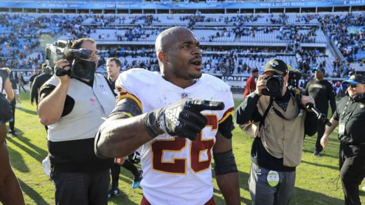 JACKSONVILLE, FL - DECEMBER 16: Adrian Peterson #26 of the Washington Redskins celebrates following the Redskins 16-13 win over the Jacksonville Jaguars at TIAA Bank Field on December 16, 2018 in Jacksonville, Florida. (Photo by Sam Greenwood/Getty Images)