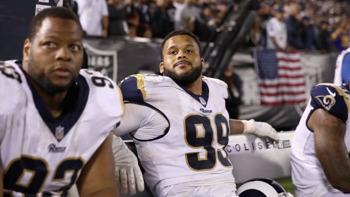 OAKLAND, CA – SEPTEMBER 10: Aaron Donald #99 of the Los Angeles Rams sits on the bench during their game against the Oakland Raiders at Oakland-Alameda County Coliseum on September 10, 2018 in Oakland, California. (Photo by Ezra Shaw/Getty Images)