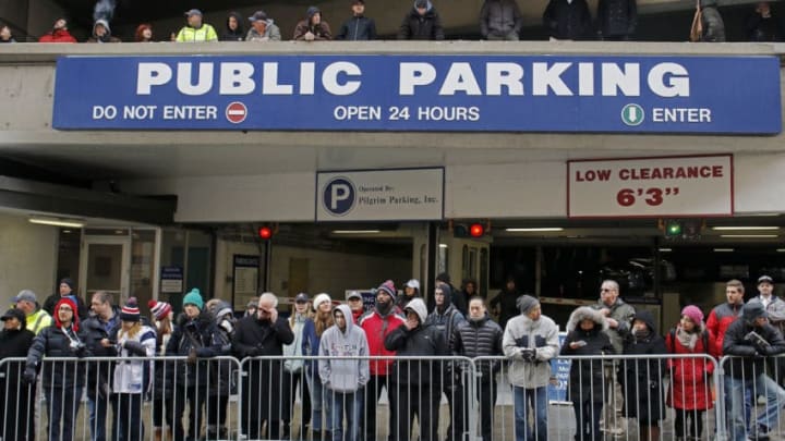 BOSTON - FEBRUARY 4: People line a parking garage along Belvedere Street as the New England Patriots made their way down Boylston Street during their Super Bowl victory parade. (Photo by Sean Proctor/The Boston Globe via Getty Images)