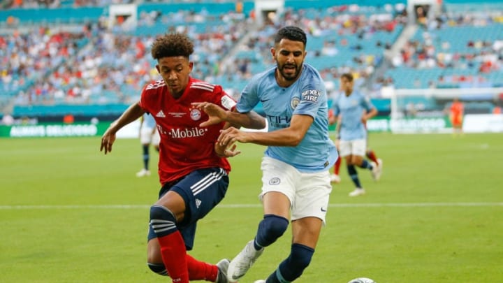 MIAMI, FL - JULY 28: Chris Richards #34 of Bayern Munich defends Riyad Mahrez #26 of Manchester City during the first half of the International Champions Cup at Hard Rock Stadium on July 28, 2018 in Miami, Florida. (Photo by Michael Reaves/Getty Images)
