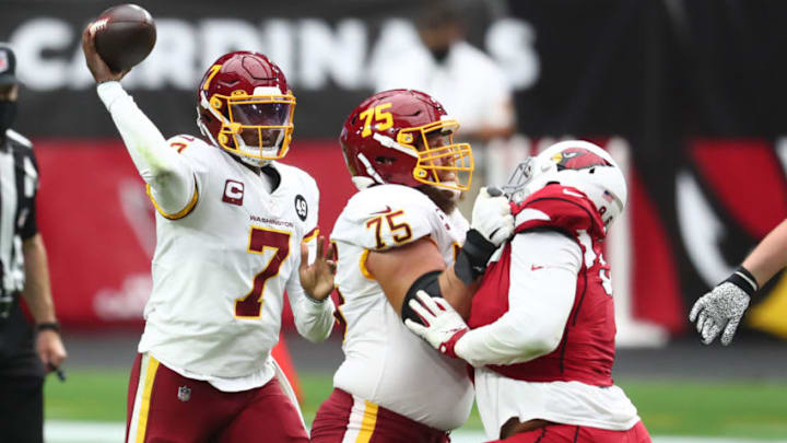 Sep 20, 2020; Glendale, Arizona, USA; Washington Football Team guard Brandon Scherff (75) blocks for quarterback Dwayne Haskins Jr. (7) against the Arizona Cardinals at State Farm Stadium. Mandatory Credit: Mark J. Rebilas-USA TODAY Sports Sep 20, 2020; Glendale, Arizona, USA; Washington Football Team guard Brandon Scherff (75) blocks for quarterback Dwayne Haskins Jr. (7) against the Arizona Cardinals at State Farm Stadium. Mandatory Credit: Mark J. Rebilas-USA TODAY Sports