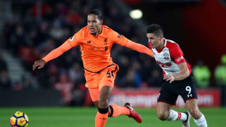 Virgil van Dijk  battles for possession with Guido Carrillo of Southampton during the Premier League match between Southampton and Liverpool. (Photo by Julian Finney/Getty Images)