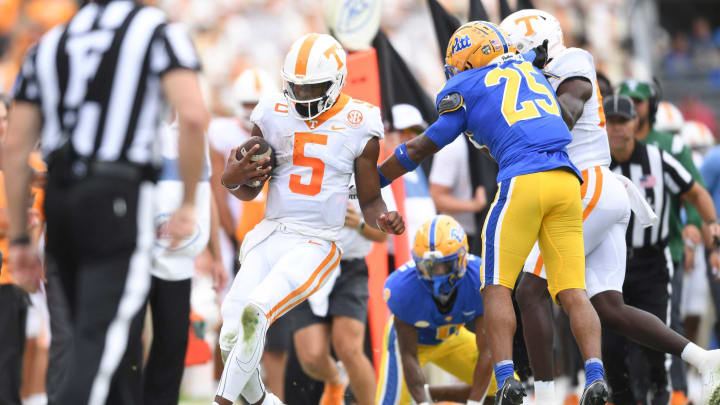 Tennessee quarterback Hendon Hooker (5) runs out of bounds during a game between the Tennessee Volunteers and Pittsburgh Panthers in Acrisure Stadium in Pittsburgh, Saturday, Sept. 10, 2022. Tennessee defeated Pitt 34-27 in overtime.Tennpitt0910 01570