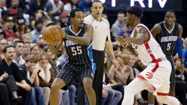 Mar 20, 2016; Toronto, Ontario, CAN; Orlando Magic guard Brandon Jennings (55) looks to play a ball as Toronto Raptors forward Terrence Ross (31) tries to defend during the fourth quarter at Air Canada Centre. The Toronto Raptors won 105-100. Mandatory Credit: Nick Turchiaro-USA TODAY Sports