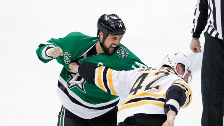 DALLAS, TX - FEBRUARY 26: Dallas Stars Left Wing Jamie Benn (14) and Boston Bruins Right Wing David Backes (42) fight 2 seconds into the NHL hockey game between the Boston Bruins and Dallas Stars on February 26, 2017, at American Airlines Center in Dallas, TX. (Photo by Andrew Dieb/Icon Sportswire via Getty Images)