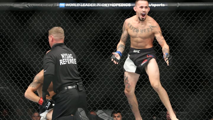 UNIONDALE, NY - JULY 22: Marlon Vera (R) celebrates his submission win over Brian Kelleher (L) in their UFC Fight Night bantamweight bout at the Nassau Veterans Memorial Coliseum on July 22, 2017 in Uniondale, New York. (Photo by Ed Mulholland/Getty Images)