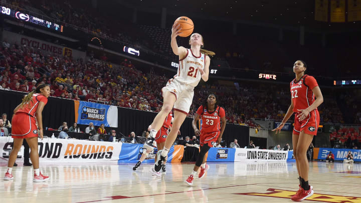 Iowa State Cyclones guard Lexi Donarski (21) lays up the ball against Georgia Bulldogs forward Malury Bates (22) during the fourth quarter in the NCAA women’s basketball second-round at Hilton Coliseum Sunday, March 20, 2022, in Ames, Iowa.