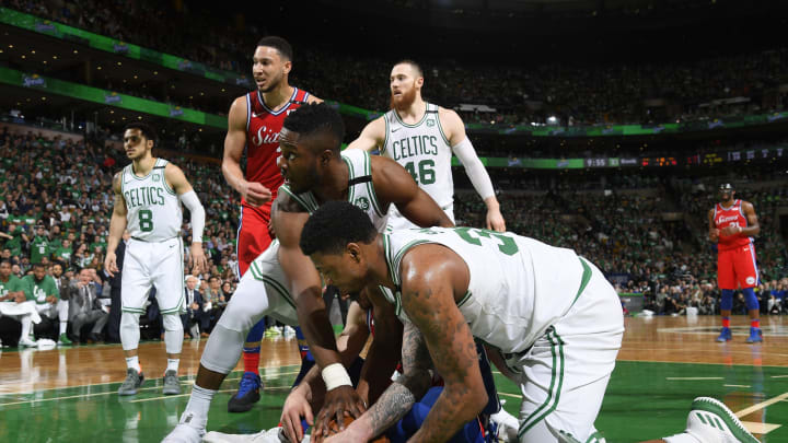 BOSTON, MA – APRIL 30: Marcus Smart #36 of the Boston Celtics fights for the rebound against the Philadelphia 76ers in Game One of the Eastern Conference Semifinals of the 2018 NBA Playoffs on April 30, 2018 at TD Garden in Boston, Massachusetts. NOTE TO USER: User expressly acknowledges and agrees that, by downloading and or using this Photograph, user is consenting to the terms and conditions of the Getty Images License Agreement. Mandatory Copyright Notice: Copyright 2018 NBAE (Photo by Brian Babineau/NBAE via Getty Images)