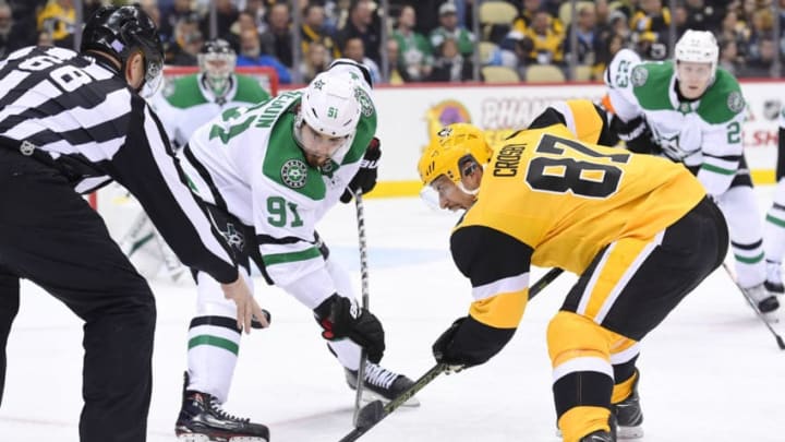 PITTSBURGH, PA - NOVEMBER 21: Dallas Stars Center Tyler Seguin (91) and Pittsburgh Penguins Center Sidney Crosby (87) face-off during the second period in the NHL game between the Pittsburgh Penguins and the Dallas Stars on November 21, 2018, at PPG Paints Arena in Pittsburgh, PA. (Photo by Jeanine Leech/Icon Sportswire via Getty Images)