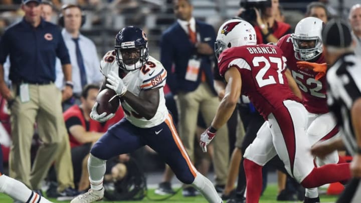 GLENDALE, AZ - AUGUST 19: Tarik Cohen #29 of the Chicago Bears runs with the ball while being chased by Tyvon Branch #27 of the Arizona Cardinals during the first half at University of Phoenix Stadium on August 19, 2017 in Glendale, Arizona. The Bears won 24-23. (Photo by Norm Hall/Getty Images)