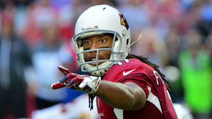 Dec 4, 2016; Glendale, AZ, USA; Arizona Cardinals wide receiver Larry Fitzgerald (11) signals to teammates during the first half against the Washington Redskins at University of Phoenix Stadium. Mandatory Credit: Matt Kartozian-USA TODAY Sports