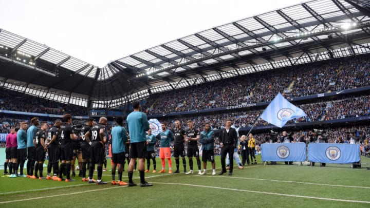 MANCHESTER, ENGLAND - APRIL 22: Swansea City team line up for a guard of honor for the Manchester City team ahead of the Premier League match between Manchester City and Swansea City at Etihad Stadium on April 22, 2018 in Manchester, England. (Photo by Laurence Griffiths/Getty Images)