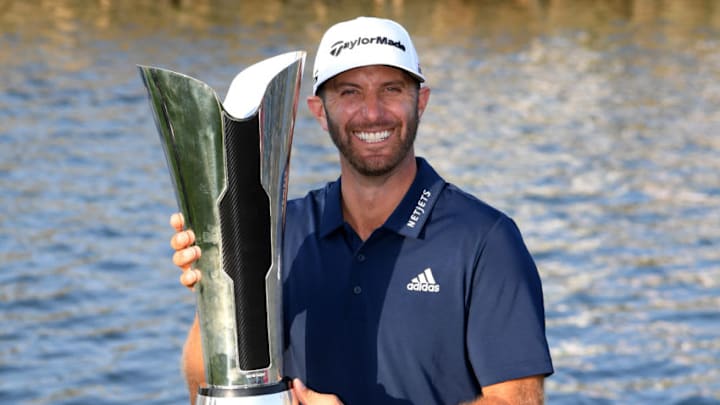 KING ABDULLAH ECONOMIC CITY, SAUDI ARABIA - FEBRUARY 03: Dustin Johnson of The United States celebrates with the trophy after the final round of the Saudi International at the Royal Greens Golf & Country Club on February 03, 2019 in King Abdullah Economic City, Saudi Arabia. (Photo by Ross Kinnaird/Getty Images)