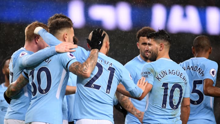 MANCHESTER, ENGLAND - JANUARY 02: Sergio Aguero of Manchester City celebrates after scoring his sides third goal with his Manchester City team mates during the Premier League match between Manchester City and Watford at Etihad Stadium on January 2, 2018 in Manchester, England. (Photo by Laurence Griffiths/Getty Images)