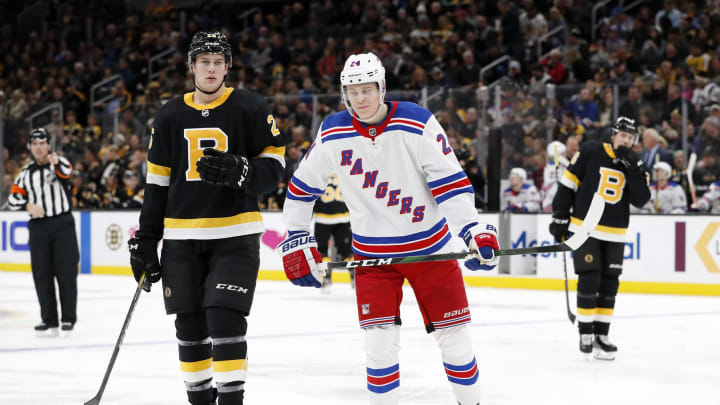 BOSTON, MA – NOVEMBER 29: Boston Bruins right defenseman Brandon Carlo (25) and New York Rangers right wing Kaapo Kakko (24) skate out for a shift during a game between the Boston Bruins and the New York Rangers on November 29, 2019, at TD Garden in Boston, Massachusetts. (Photo by Fred Kfoury III/Icon Sportswire via Getty Images)