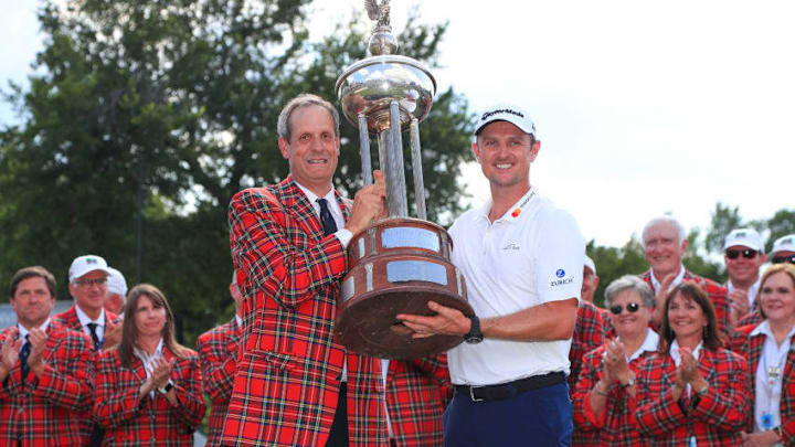 FORT WORTH, TX - MAY 27: Colonial Country Club President Rob Doby presents the trophy to Justin Rose of England after he won the Fort Worth Invitational at Colonial Country Club on May 27, 2018 in Fort Worth, Texas. (Photo by Tom Pennington/Getty Images)