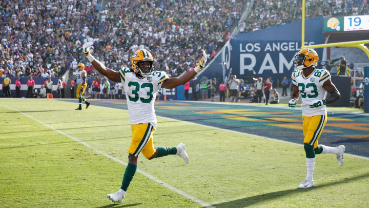 LOS ANGELES, CA – OCTOBER 28: Running back Aaron Jones #33 of the Green Bay Packers celebrates in the game against the Los Angeles Rams at Los Angeles Memorial Coliseum on October 28, 2018 in Los Angeles, California. (Photo by Joe Robbins/Getty Images)