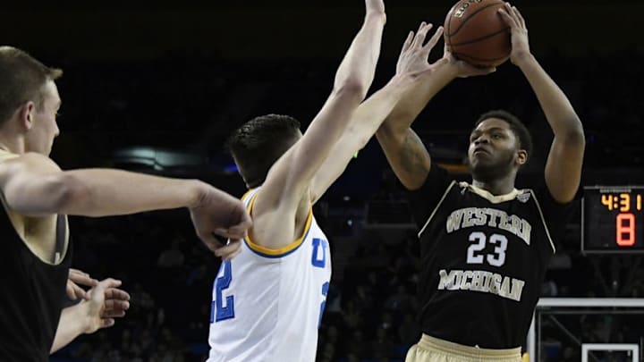 Dec 21, 2016; Los Angeles, CA, USA; Western Michigan Broncos guard Reggie Jones (23) shoots against UCLA Bruins forward TJ Leaf (22) in the first half at Pauley Pavilion. Mandatory Credit: Richard Mackson-USA TODAY Sports Dec 21, 2016; Los Angeles, CA, USA; Western Michigan Broncos guard Reggie Jones (23) shoots against UCLA Bruins forward TJ Leaf (22) in the first half at Pauley Pavilion. Mandatory Credit: Richard Mackson-USA TODAY Sports