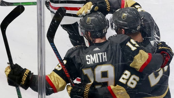 Reilly Smith #19 of the Vegas Golden Knights celebrates a goal with teammate Paul Stastny #26 against the Chicago Blackhawks during the third period in Game One of the Western Conference First Round