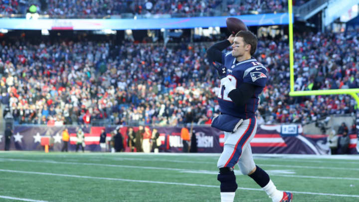 FOXBOROUGH, MASSACHUSETTS - DECEMBER 30: Tom Brady #12 of the New England Patriots warms up on the sideline during the game against the New York Jets at Gillette Stadium on December 30, 2018 in Foxborough, Massachusetts. (Photo by Maddie Meyer/Getty Images)