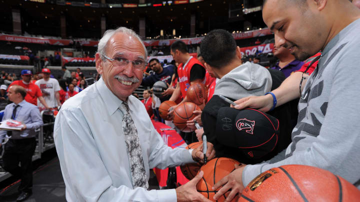 LOS ANGELES, CA – MARCH 13: Los Angeles Clippers Radio/TV personality Ralph Lawler signs autographs before the game against the Memphis Grizzlies at Staples Center on March 13, 2013 in Los Angeles, California. (Photo by Andrew D. Bernstein/NBAE via Getty Images)