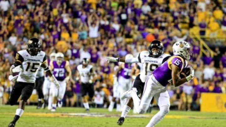 LSU Tigers wide receiver Malachi Dupre (15) catches a touchdown. Mandatory Credit: Derick E. Hingle-USA TODAY Sports